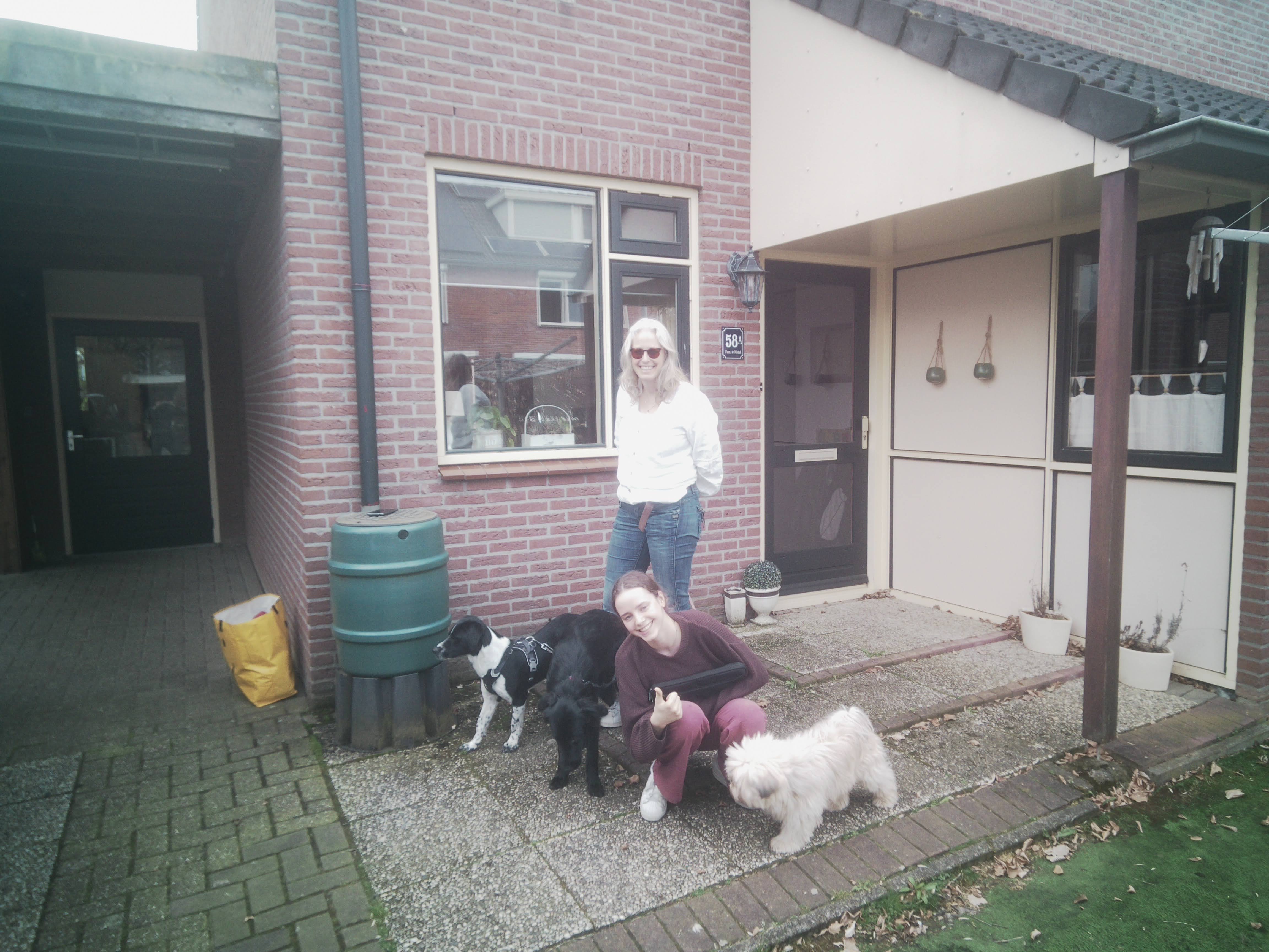 Mom and sister with our three dogs