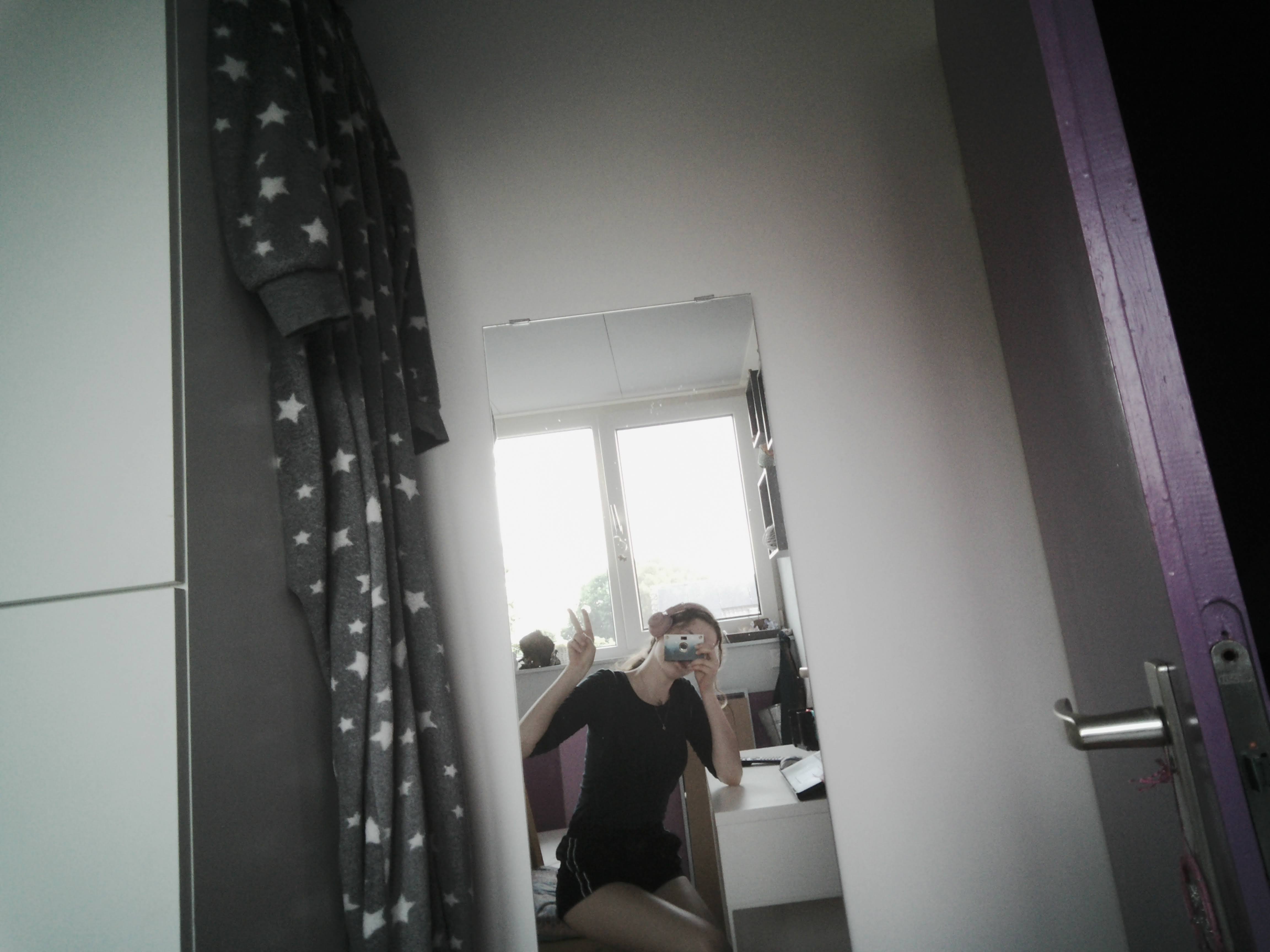 Mirror selfie with disposible camera